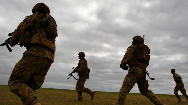 australia might fire 13 troops over war crime in australia