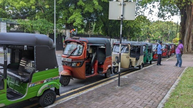 autorickshaw drivers queue for fuel in colombo