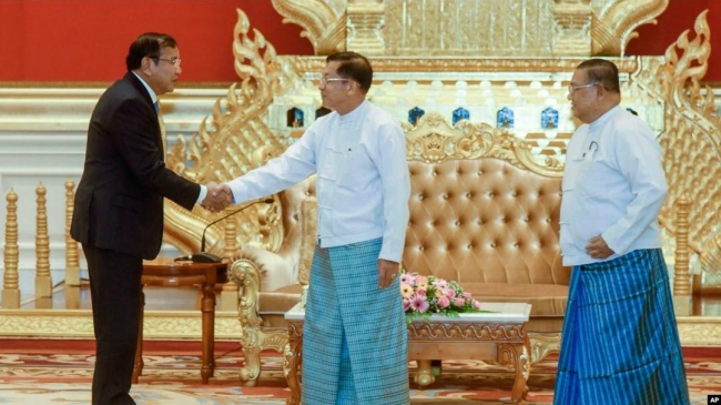 china s top diplomat visits myanmar amid opposition protest