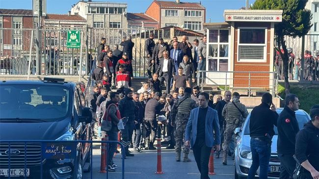 crowds gather at the gates of caglayan courthouse