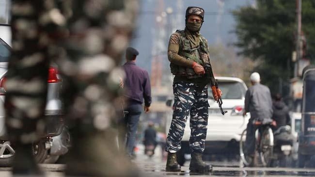 crpf guard on a street in srinagar