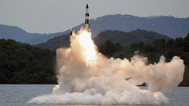 dprk launches missile into sea after warplanes fly near border seoul