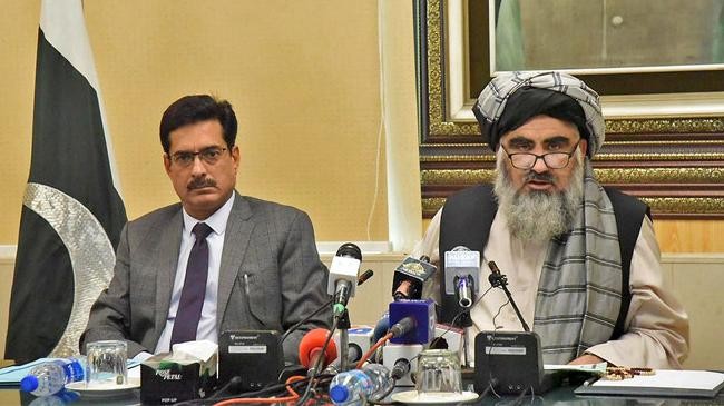 federal minister for religious affairs mufti abdul shakoor right