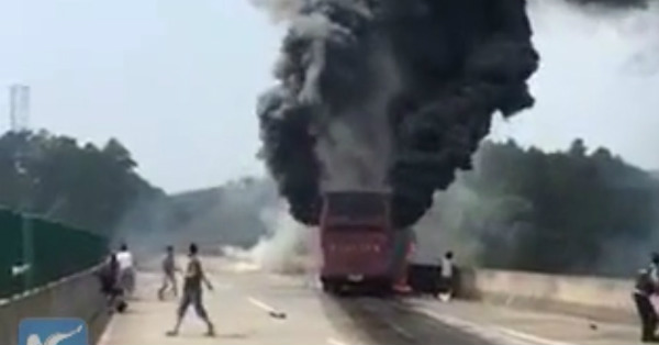 fire in tourist bus in china 30 killed