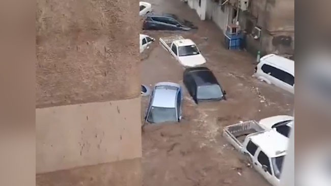 flash floods wash away vehi