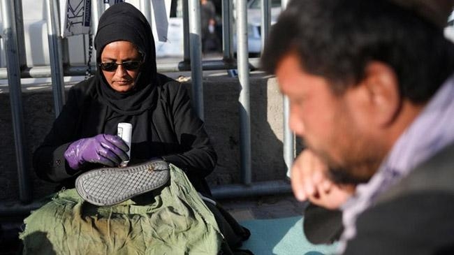hadia ahmadi waxes shoes kabul
