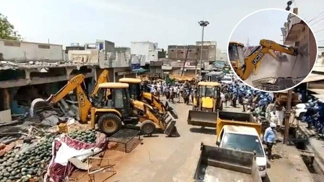 house broken into by bulldozer