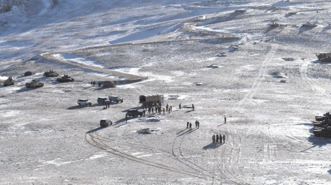 indian and chinese troops disengaging from disputed border area