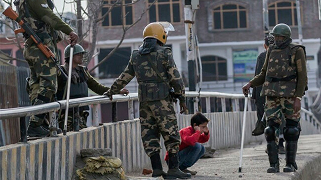 indian army and a kashmiri boy