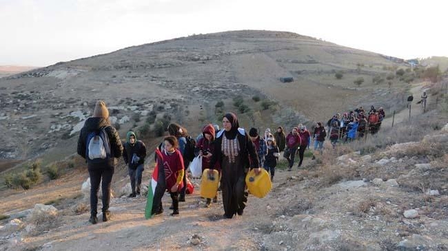 israel settlers pollute spring water