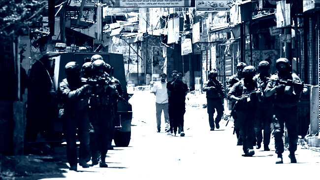 israeli forces detain palestinians during their raid