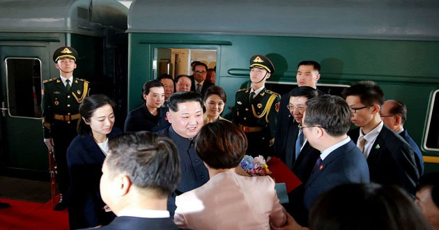 kim in the train on the way to vietnam