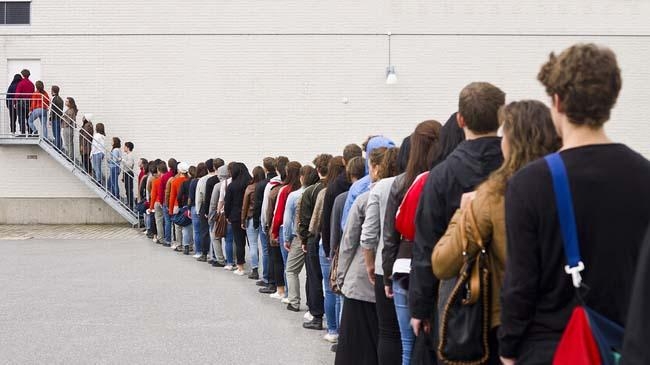 long man queue in the road