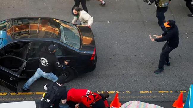 man drives car into george floyd protest crowd01