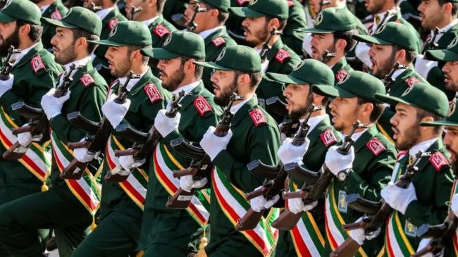 members of irans revolutionary guards corps march