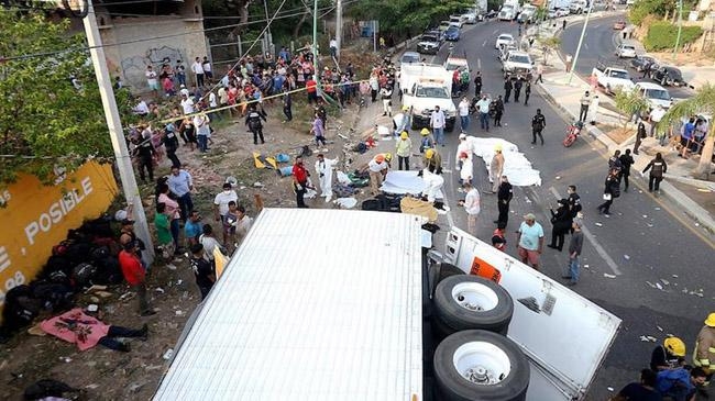 mexico truck over turn migrant