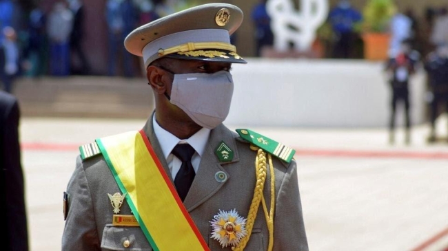 military leader signs election law to design mali s political arena