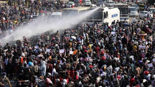 myanmar using water cannon to stop protest