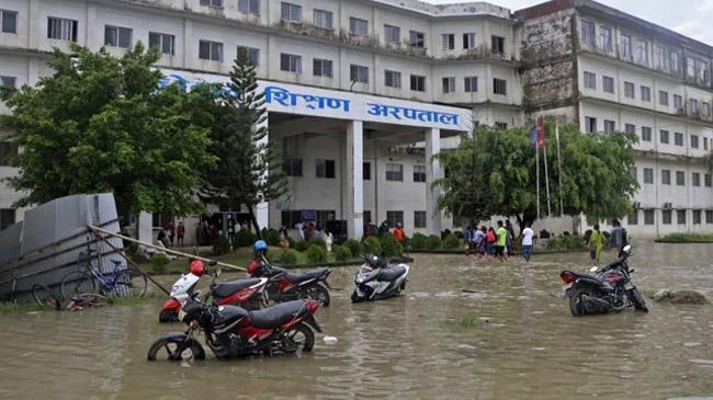 nepal flood lost live 77 landslide
