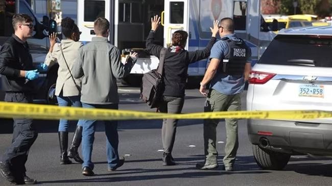 police work at the scene of a fatal shooting
