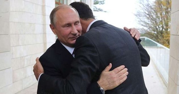 putin and bashar al asad hugging