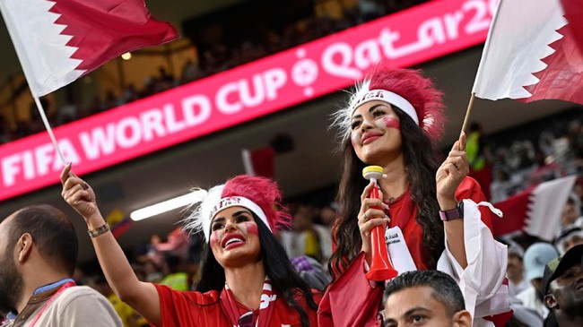 qatar world cup women supporter pleased