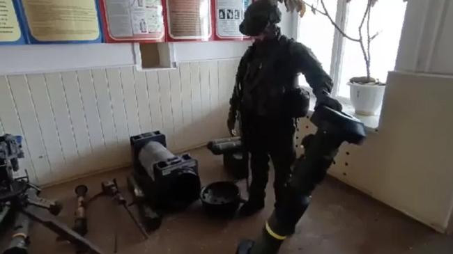 russian soldier holds up a us made javelin anti tank missile