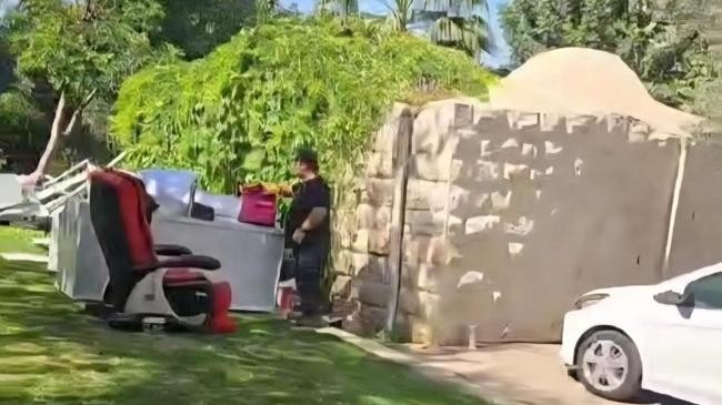 settler defiles shrine turns it into house