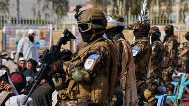 taliban badri 313 unit stand guard
