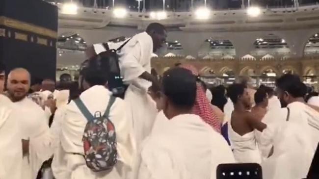 tallest man at kaaba