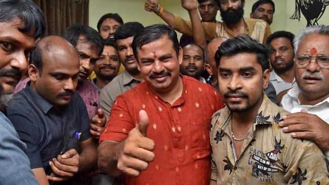 telangana mla t. raja singh gestures after he was released