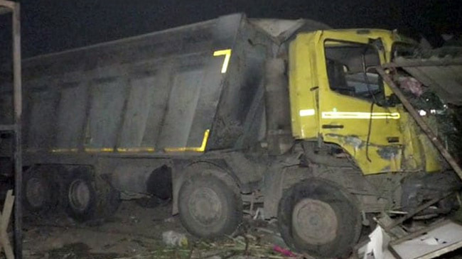 trucks on sleeping workers