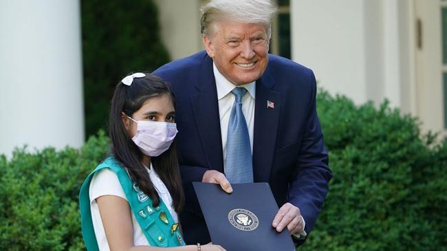 trump giving salute to a child
