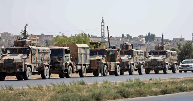 turkey troops and tanks in syria border