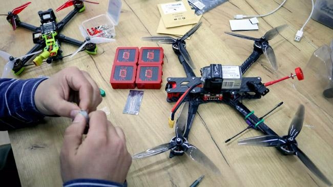 ukrainian activist examines drones lviv