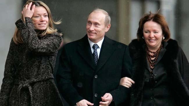 vladimir putin with his wife lyudmilla right and his daughter mariya putina