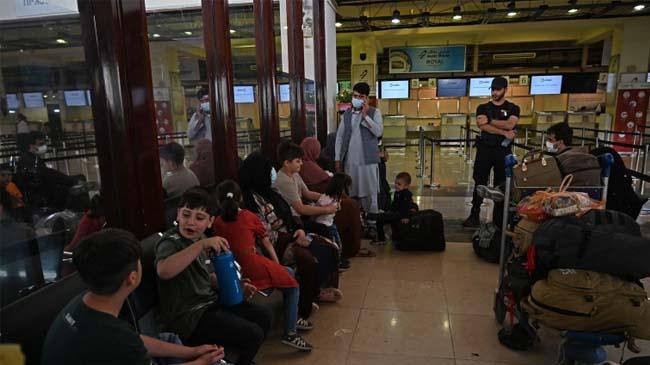 waiting passengers for qatar flight