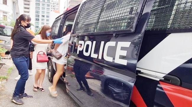 women arrested singapore