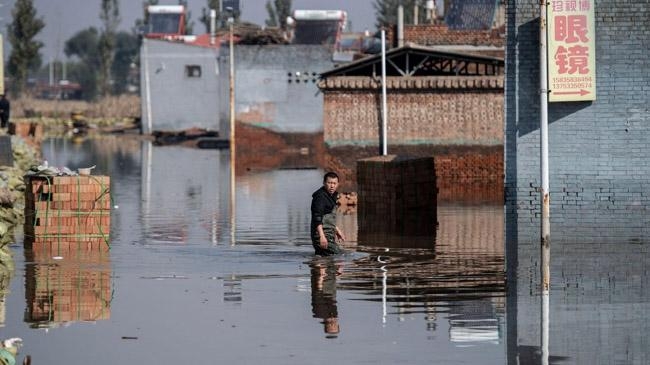 world climate change women men