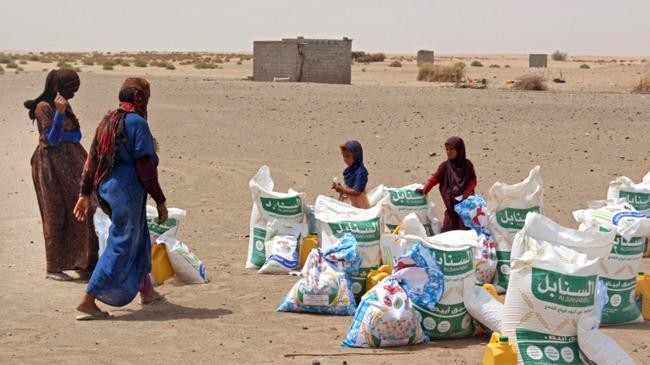 yemeni families receive flour rations