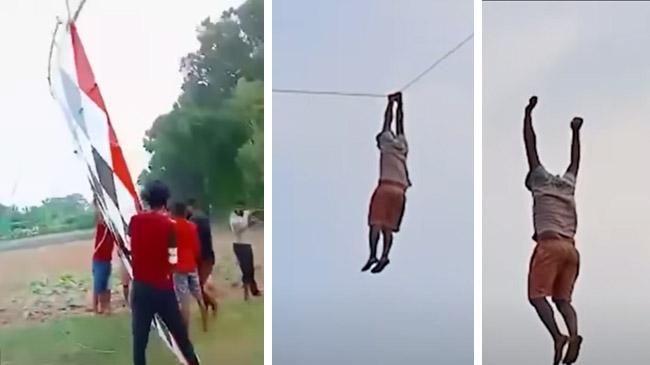 young man is flying in kite