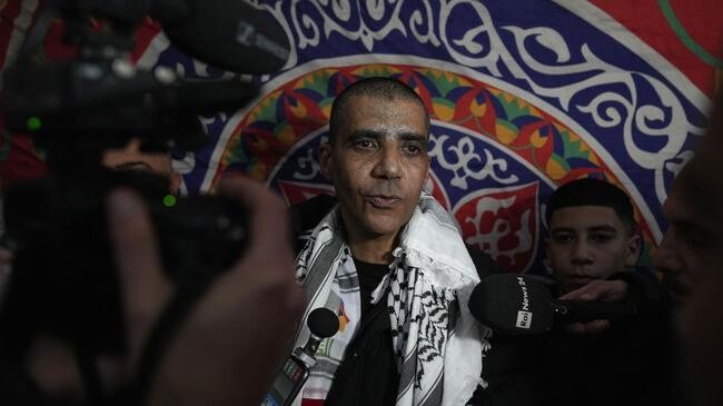 zakaria zubeidi talks to the media